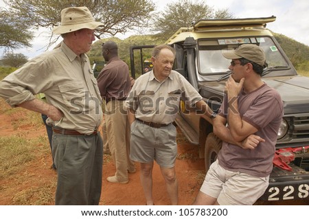 JANUARY 2005 - Cinematographer of Out of Africa speaks with John Taft and Humane Society CEO Wayne Pacelle in Tsavo National Park Kenya Africa