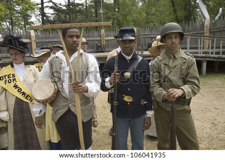 Past and present African American soldiers posing as part of the 400th anniversary of the Jamestown Colony, Virginia, at the James Fort, Jamestown Settlement, May 4, 2007