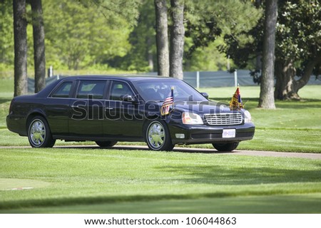 Black Presidential Limo and American Flag on golf course in Williamsburg, Virginia on May 4, 2007