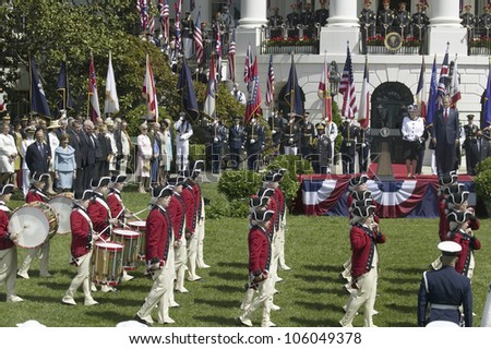 President George W. Bush and Queen Elizabeth II reviewing the U.S. Army Old Guard Fife and Drum Corps marching across the South Lawn May 7, 2007.