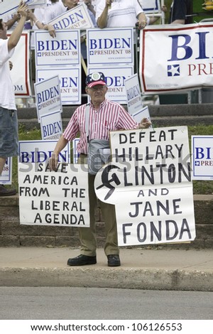 Man protesting US Senator Hillary Clinton during her campaign debate in Des Moines, Iowa, August 19, 2007