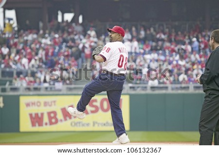 Mayor Michael Nutter throwing opening pitch of baseball game on March 31, 2008, Citizen Bank Park where 44,553 attend as the Washington Nationals defeat the Philadelphia Phillies 11 to 6.