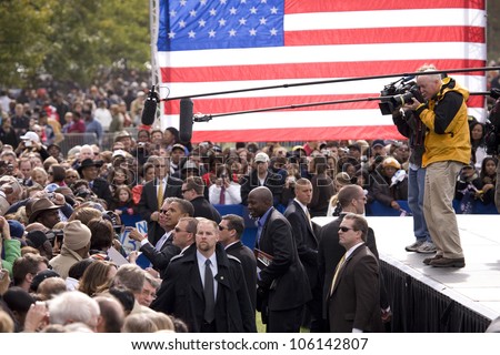 Media covers US Senator Barack Obama as he shakes hands at early vote for change Presidential rally, October 29, 2008 at Halifax Mall, Government Complex in Raleigh, NC