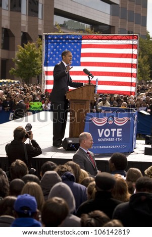 Presidential Candidate Barack Obama framed against American Flag at early vote for change Presidential rally, October 29, 2008 at Halifax Mall, Government Complex in Raleigh, NC