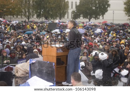 US Senator Barack Obama speaking at podium in pouring rain at Presidential Rally on October 28, 2008, at Widener University in Chester, PA