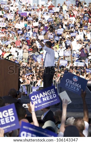 US Senator Barack Obama waving to crowd at Early Vote for Change Presidential rally, October 25, 2008 at Bonanza High School, Judy K. Cameron Stadium in Las Vegas, NV