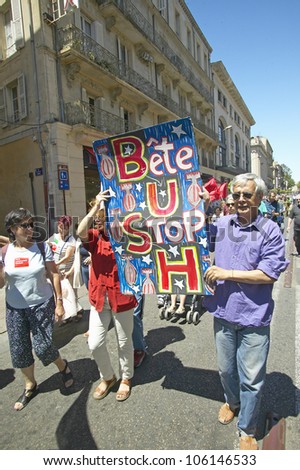 JUNE 2004 - Parade demonstration against war in Irag, Anti-George W. Bush Sign, Avignon, France