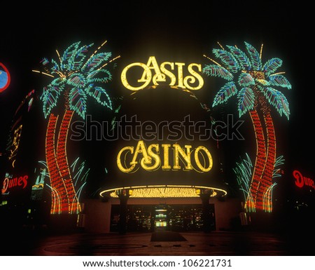 FEBRUARY 2005 - Neon lights outside of Oasis Casino and Hotel at night, Las Vegas, NV