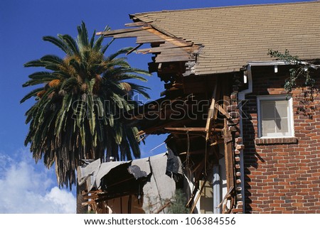 Side view of house ripped apart