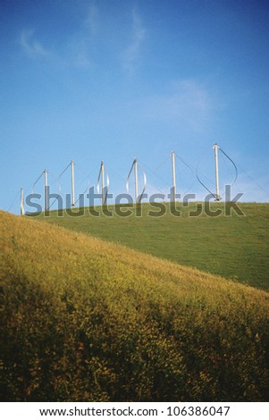 Landscape with vertical-axis wind turbines