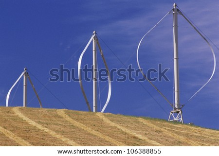 Vertical-axis wind turbines on hill