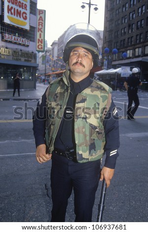 CIRCA 1992 - Police in riot gear, downtown Los Angeles, California