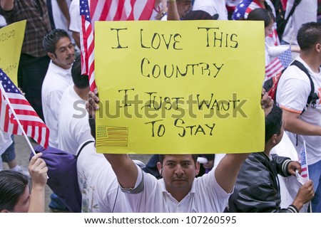 Man Holds Sign Saying &Quot;I Love This Country&Quot; In March For Immigrants And Mexicans Protesting Against Illegal Immigration Reform By U.S. Congress, Los Angeles, Ca, May 1, 2006