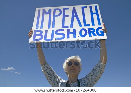 MARCH 2005 - Political rally with a sign reading Impeach Bush in Tucson, AZ