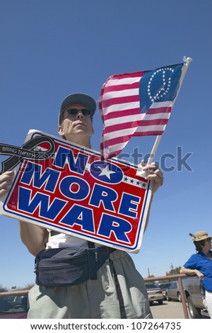 MARCH 2005 - Picture of anti-Bush political rally in Tucson, AZ with sign reading No More War