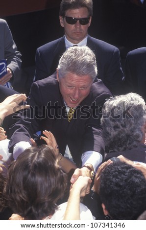 Former President Bill Clinton meets the crowd at a Santa Barbara City College campaign rally in 1996, Santa Barbara, California
