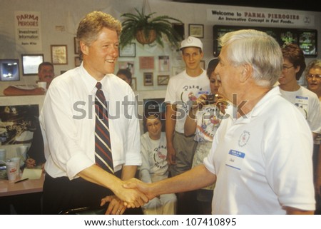 Governor Bill Clinton shakes hands with the owner of Parma Peiroges Restaurant during the Clinton/Gore 1992 Buscapade campaign tour in Parma, Ohio