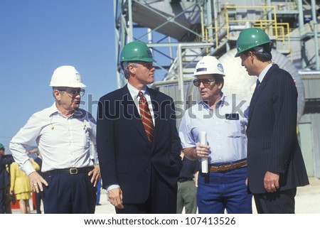 Governor Bill Clinton and Senator Al Gore meet with workers at an electric station on the 1992 Buscapade campaign tour in Waco, Texas