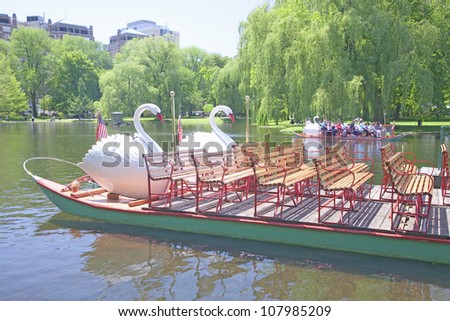 Swan Boat with tourists in Public Garden and Boston Common in summer, Boston, Ma., New England, USA
