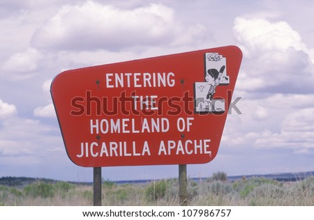 Bright red sign Entering the Homeland of Jicarilla Apache in New Mexico