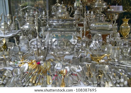 Silverware and silver items for sale at Flea Market, Paris, France