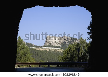 Tunnel on Iron Mountain Road in Black Hills framing view of Mount Rushmore National Memorial, South Dakota