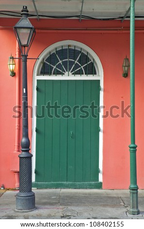 Old freshly painted doors in French Quarter near Bourbon Street in New Orleans, Louisiana