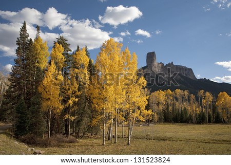 Chimney Peak and aspens in the foreground at Courthouse Mountains in the Uncompahgre National Forest, Colorado
