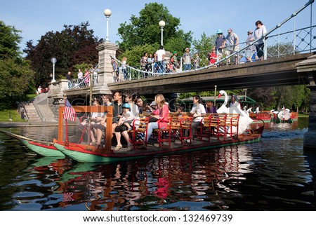 BOSTON - MAY 27: Swan boat with tourists in Public Garden, Boston Common on May 27, 2012, Boston, MA.