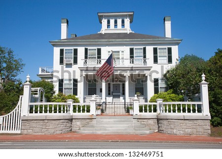 AUGUSTA, ME - JUNE 10: Governors Mansion with US flag on June 10, 2012 in Augusta, Maine.
