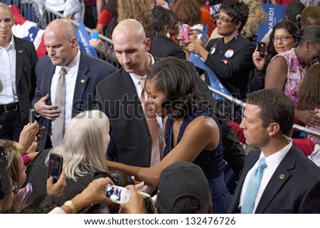 LAS VEGAS - OCTOBER 26: First Lady Michelle Obama among supporters at President Obama`s campaign rally on October 26, 2012 at Orr Middle School in Las Vegas, Nevada.