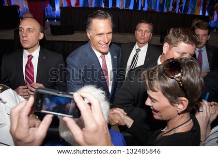 RENO - SEPTEMBER 11: Mitt Romney shakes hands with supporters at the annual meeting of the National Guard Association on September 11, 2012 in Reno, Nevada.