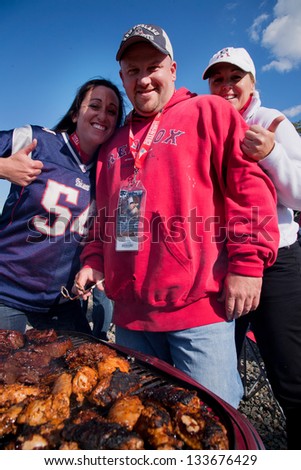 BOSTON - OCTOBER 16: Football fans making barbeque before New England Patriots vs. Dallas Cowboys at Gillette Stadium on October 16, 2011 in Foxborough, Boston, MA