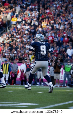 BOSTON - OCTOBER 16: Quarterback Tony Romo, No 9 of Dallas Cowboys, passes football at Gillette Stadium, New England Patriots vs. Dallas Cowboys on October 16, 2011 in Foxborough, Boston, MA