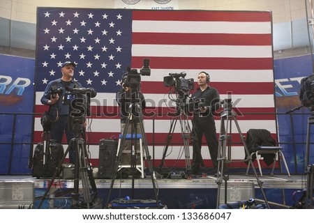 LAS VEGAS - OCTOBER 26: National Press and TV cameramen at an event hosted by First Lady Michelle Obama at Orr Middle School on October 26, 2012 in Las Vegas, Nevada