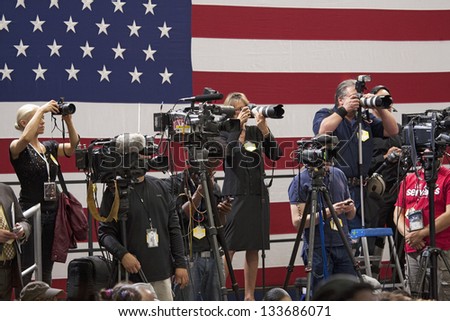 LAS VEGAS - OCTOBER 26: Photographers and TV cameramen at an event hosted by First Lady Michelle Obama at Orr Middle School on October 26, 2012 in Las Vegas, Nevada