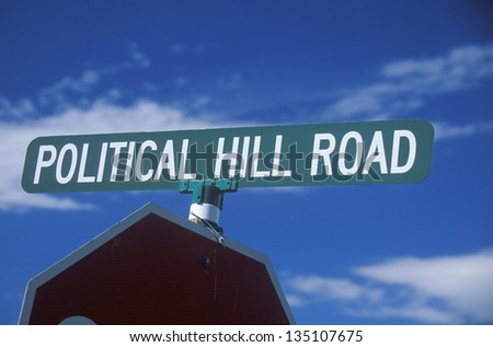 Political Hill Road sign against the sky