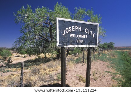 Welcome to Joseph City sign next to a fence
