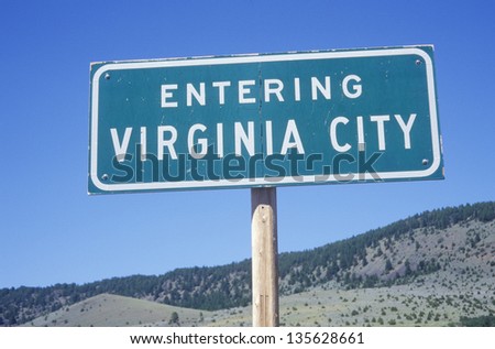 Entering Virginia City sign against the sky