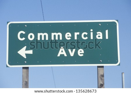 Commercial Ave sign against the sky