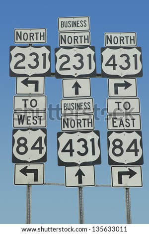 State highway signs pointing in all directions in Southeast USA