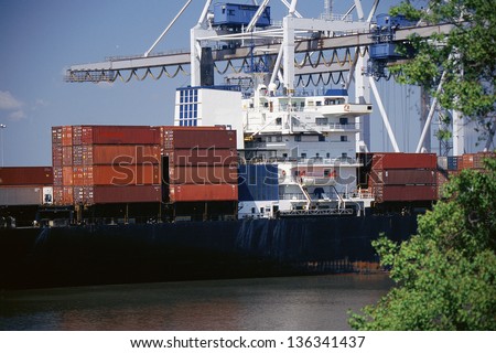 Container ship and harbor crane in the port of Savannah, Georgia
