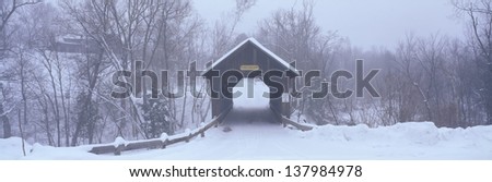 Snow covered bridge in winter in New England