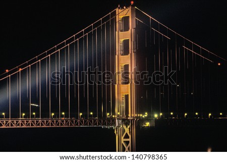SAN FRANCISCO - NOV 11:Dramatic lighting on the Golden Gate Bridge for it\'s 50th Anniversary, San Francisco, California on November 11, 2004 in San Francisco, California.