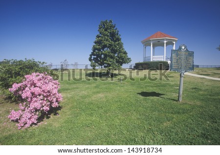 Pink Magnolias in Natchez, MS - sign and gazebo in roadside park overlooking MS River