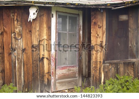 Close-up of the door on a deserted old cabin in summer in Centennial Valley near Lakeview, MT