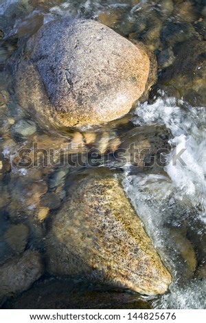 Close-up of rock in a  stream at Crawford Notch State Park in White Mountains of New Hampshire, New England