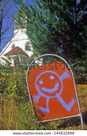 Sign with happy cartoon character at Nursery School in Autumn in Catskills, NY