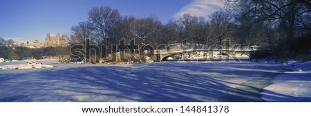 Bridge over frozen pond in Central Park, Manhattan, NY on upper west side near Central Park West