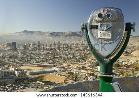 Long range binoculars and downtown of El Paso in Texas looking toward Juarez, Mexico